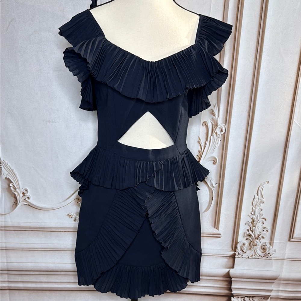 GOEN.JBlue  Sleeveless Ruffled Cut Out Mini Dress